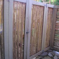 Ray Newkirk General Contractor: Bamboo redwood movable trash enclosure