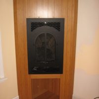 Ray Newkirk General Contractor: Propane Direct Vent Fireplace Enclosure From Same Bamboo Flooring as Surrounding Floor